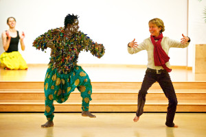 Image of 2 people in costume dancing Awal and Erika